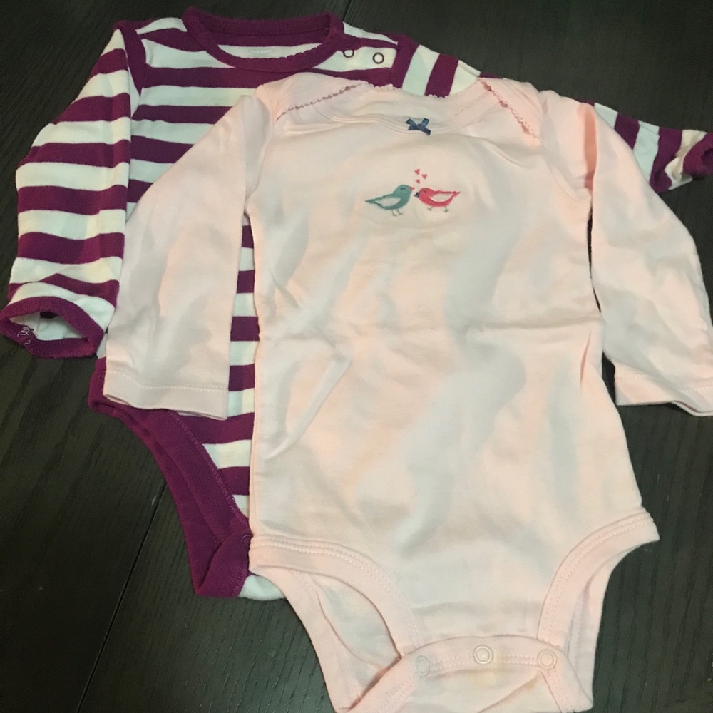 Two infant girl long sleeve onesies